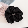 Detail of black denim fabric scrunchie showing premium twill texture and pleated design - Black