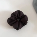 Detailed view of dark brown textured fabric scrunchie with visible woven texture and white label - 5# Red Coffee Scrunchie