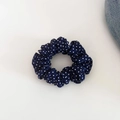 Detail of dark blue polka dot scrunchie fabric texture and elastic design - Navy Blue Polka Dots