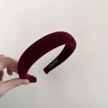Detail view of burgundy velvet headband showing black inner lining and golden woven label - 3# Wine Red