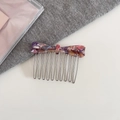 Detalle de un peine para el cabello con lazo de acetato jaspeado y dientes de metal - 3# Color Mixto