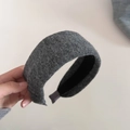 Detailed view of the dark grey textured knit fabric and inner lining of the wide headband - 2# Dark Grey