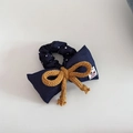 Detail of navy blue polka dot scrunchie featuring a yellow woven bow and cute puppy tag - 2# Dark Denim Blue