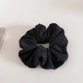 Detailed close-up of dark grey scrunchie with durable twill denim fabric texture - Black and Gray