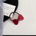 Close-up of a glossy red bow hair tie with a mirrored finish on a soft background - Hair Tie (5#)