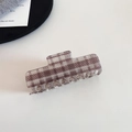 Close-up of a French style brown checkered acetate hair claw clip with smooth glossy finish - Coffee Plaid