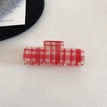 Detail view of a vintage red and white checkered rectangular hair claw clip on a white surface - Red Plaid