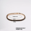 Detailed view of a gold tennis bracelet with 17cm length and black cubic zirconia stones - Gold Base Black Rhinestone Style (KSB00001KCHZ17)