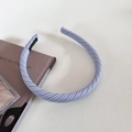 Close-up of blue and white striped fabric headband with a black non-slip inner lining - Light Blue Thin Headband