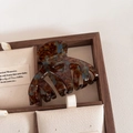 Close-up of tortoise shell acetate hair claw with gold France Handmade logo on wood - 4# Blue Brown