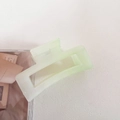 Detail of light green translucent acrylic square hair claw clip with spring mechanism - No.8 Gradient Green - Square Style