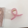 Close-up of pink jelly hair claw clip with cross design and golden metal spring - Cross Style - Pink