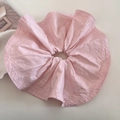 Detalle de un coletero rosa claro de gran tamaño que muestra la textura de la tela - Rosa crema