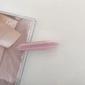 Detail of pink striped oval acetate hair clip with soft pastel texture on display - 1# Pink Stripe