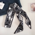 Narrow black and white geometric silk scarf with polka dots and stripes on denim background - Black White Symbols