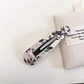 Detail of floral fabric BB hair clip with vintage purple flowers on cream background - Beige Floral Water Drop