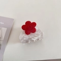 Dettaglio della pinza per capelli in acetato con fiore e scritta dorata Barrette La France - Bianco