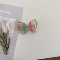 Detailed macro view of an acetate butterfly hair clip with rhinestones and floral card - 6# Pink Blue Striped