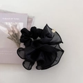 Elegant black organza scrunchie with handmade metal charm on minimalist background - Black