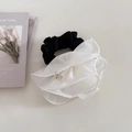 Detail of elegant black and white organza hair scrunchie with handmade metal charm - White