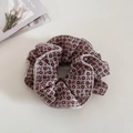 Detailed view of vintage floral scrunchie with red flowers on taupe fabric background - Red Floral (Slim Waist Style)