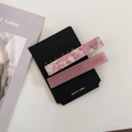 Detail of two-piece pink marbled acetate hair clips set on a branded display card - 5# Pink