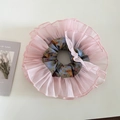 Detail of pink double-layer organza scrunchie with floral inner pattern and soft texture - Pink