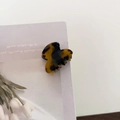 Detail of small tortoise shell acetate hair claw clip on decorative card with flowers - Dark Tortoiseshell