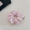 Detailed macro view of light pink cotton scrunchie with brand logo tag and soft texture - 3# Light Pink