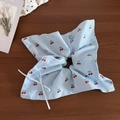 Detail of blue gingham hair scrunchie with red cherry prints and a white ribbon bow - Blue Bowknot Style