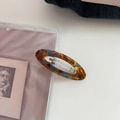 Detailansicht der ovalen Acetat-Haarklammer mit Schildpattmuster und Metallclip - 3# Blau-Braun