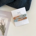 Dettaglio di fermagli per capelli in acetato retrò su cartoncino con sfondo artistico di tulipani - Floreale Blu Arancione
