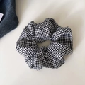 Classic black and white houndstooth checkered hair scrunchie with pleated fabric texture - Black And White Plaid Scrunchie