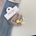Lot de trois élastiques à cheveux beiges haute élasticité avec breloques jaunes en emballage - Beige