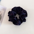 Detail of navy blue scrunchie with red hearts and contrast stitching on white background - Navy Blue