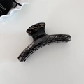 Elegante pinza de pelo grande con estampado de leopardo blanco y negro acabado brillo - Negro