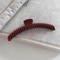 Matte burgundy large crescent hair claw clip for thick hair on a neutral fabric background - 5# Brick Red