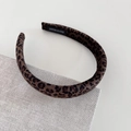 Close-up of leopard print velvet sponge headband with a hand-made interior label detail - Dark Leopard Narrow Style