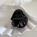 Minimalist black triangular hair claw clip on a white shell plate for elegant hairstyling - Small Pumpkin Shape - Black