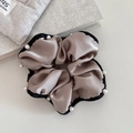 Champagne satin hair scrunchie with black trim and white pearls for stylish ponytails - Champagne