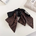 Elegant leopard print bow hair claw clip with black satin ribbon and gold metal detail - Leopard Ribbon Claw Clip