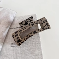 Retro leopard print acetate claw clip for thick hair shown in a minimalist setting - Square Style (10.5cm)