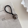 Elegante elastico per capelli con perla leopardata e cordino nero su base di libro - 2# Sfera Leopardata