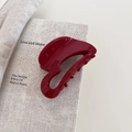 Glänzende burgunderrote Haarklammer aus Acetat mit Goldschrift für elegante französische Frisuren - Burgunderrot