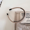Detail showing beige knitted fabric wrap and black non-slip plastic teeth on slim headband - 2# Apricot