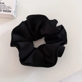 Large black pleated scrunchie made of textured elastic fabric for bun hairstyles - Black