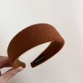 Detailed close-up of brown wool texture headband featuring a hand made woven label - 1#Caramel