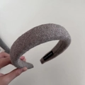 Detailed macro view of handmade wool-felt headband with thick grey textured fabric - Light Grey Camel