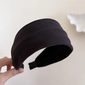 Close-up of the thick black velvet texture on this wide fashion headband for women - Black