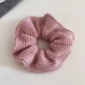 Detail of soft pink knitted hair scrunchie with fuzzy mohair texture and ribbed pattern - Pink